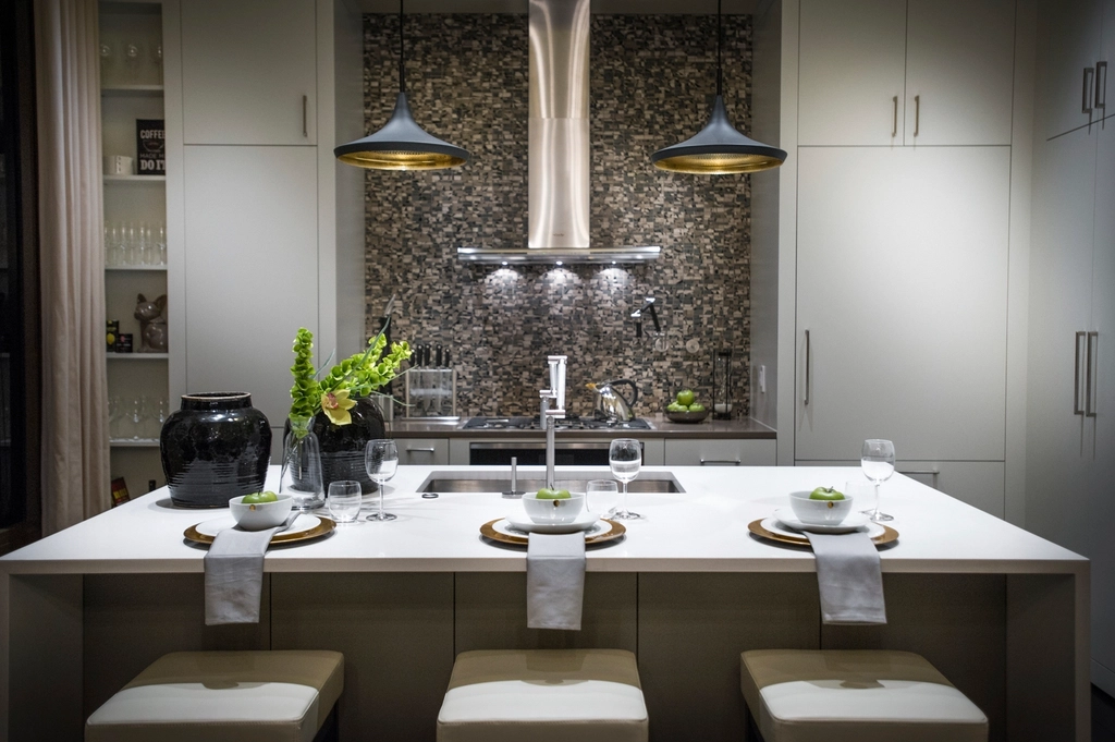 Modern kitchen island under pendant lights